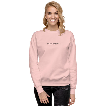 A female Model wearing Goal Digger Premium Pink Sweatshirt—motivational mindset apparel for achievers | inspirational sweater clothing by Wear Grit Brand.