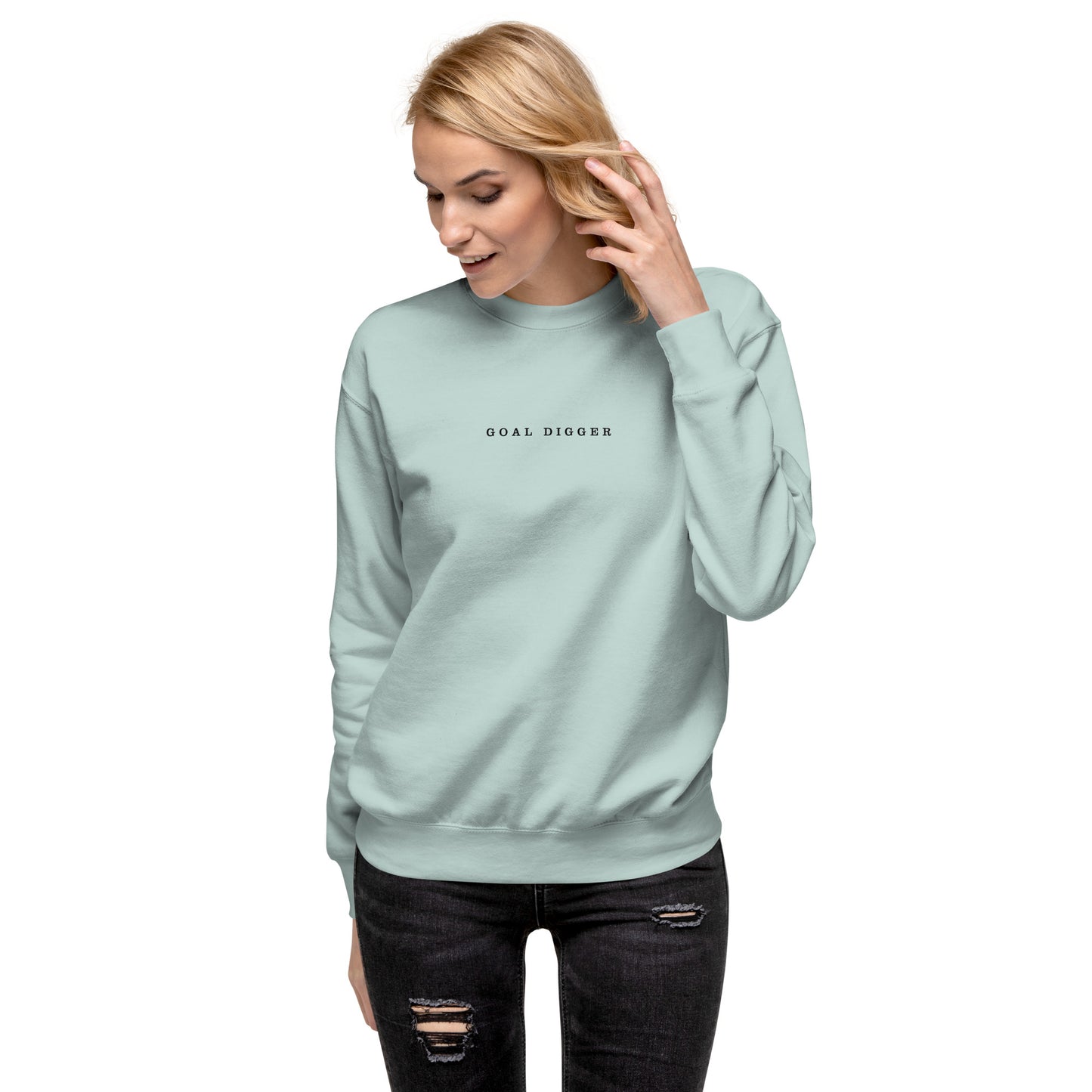 A female Model wearing Goal Digger Premium Sweatshirt—motivational mindset apparel for achievers | inspirational sweater clothing by Wear Grit Brand.