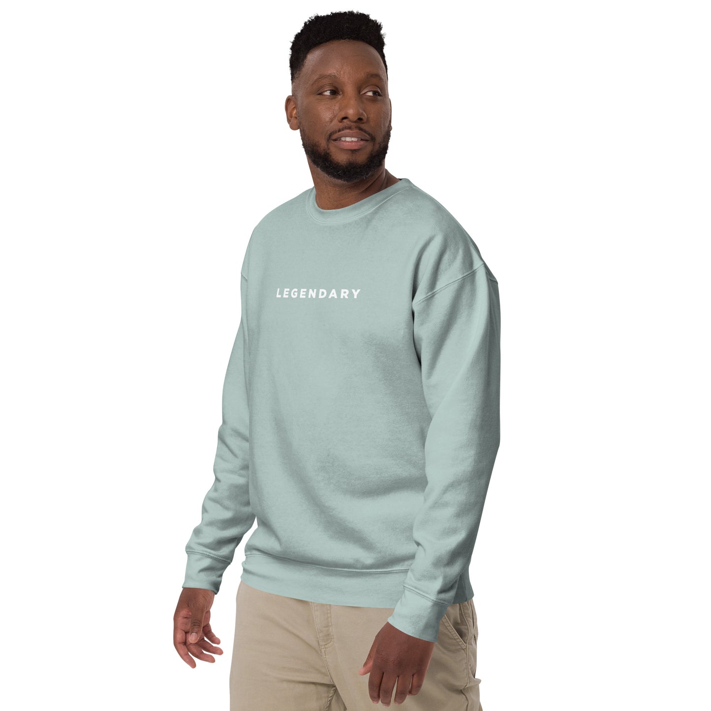 A male model wearing Legendary motivational grit sweatshirt for achievers focused on growth, discipline, and long-term success by wear grit brand clothing