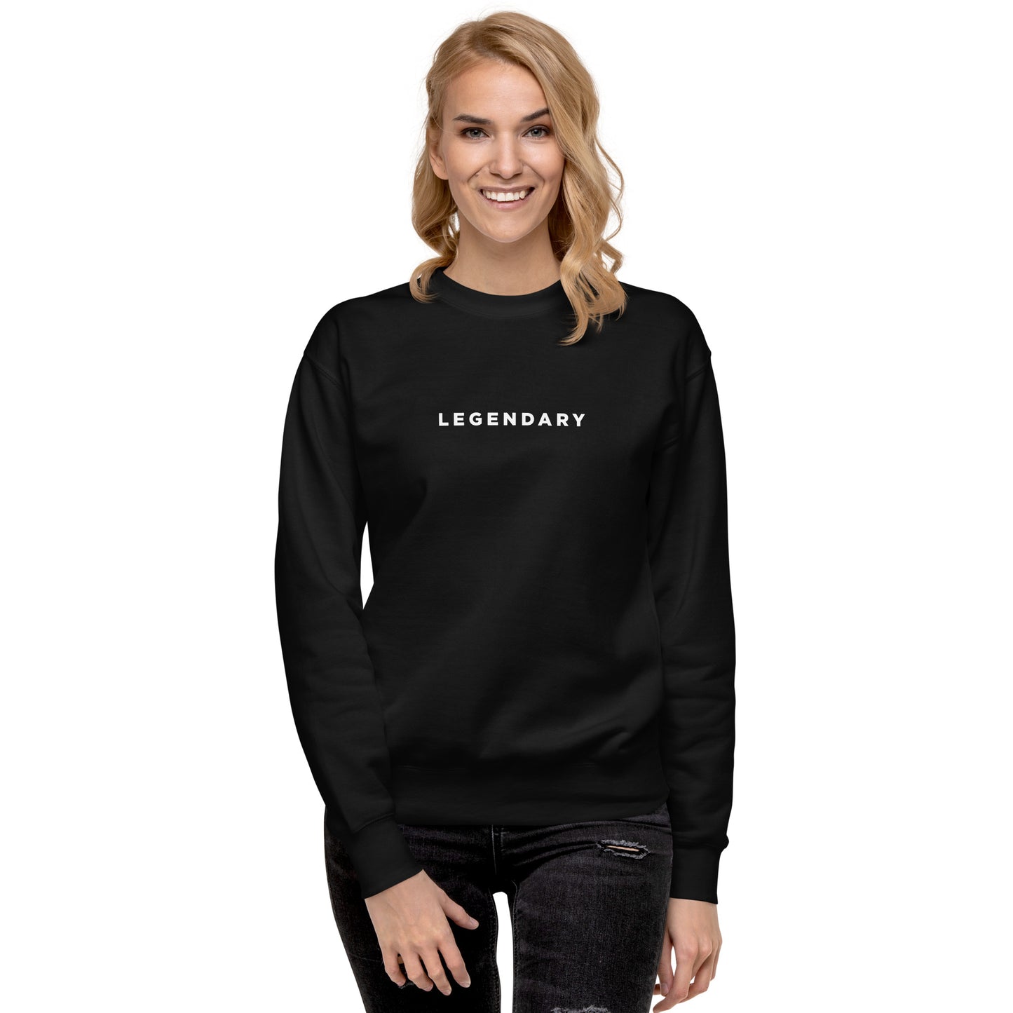 A female model wearing black Legendary motivational grit sweatshirt for achievers focused on growth, discipline, and long-term success by wear grit brand clothing