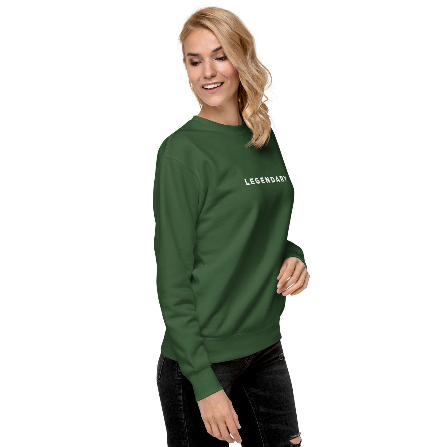 A female model wearing green Legendary motivational grit sweatshirt for achievers focused on growth, discipline, and long-term success by wear grit brand clothing