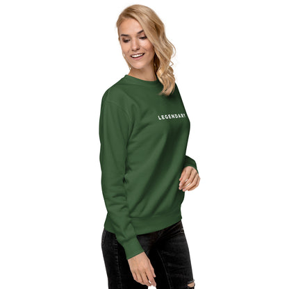 A female model wearing green Legendary motivational grit sweatshirt for achievers focused on growth, discipline, and long-term success by wear grit brand clothing