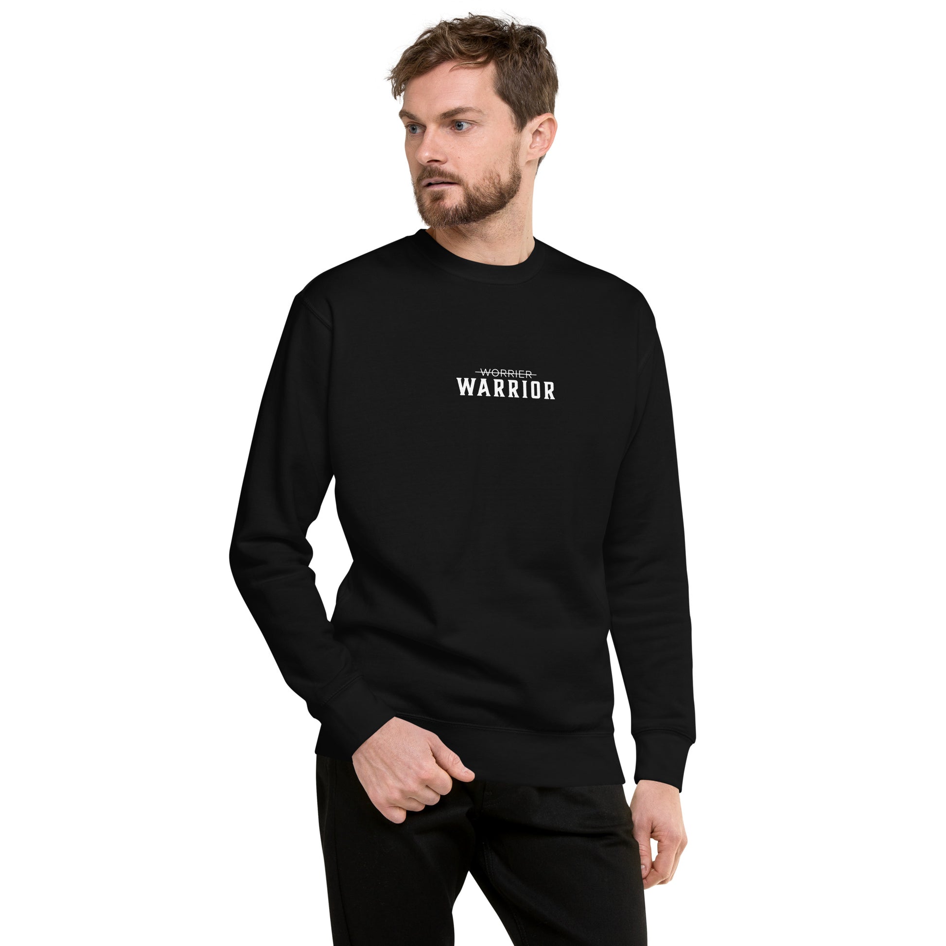 Man wearing a black long-sleeve shirt with 'WARRIOR' printed on it, a high-quality motivational sweatshirt apparel by wear grit brand clothing