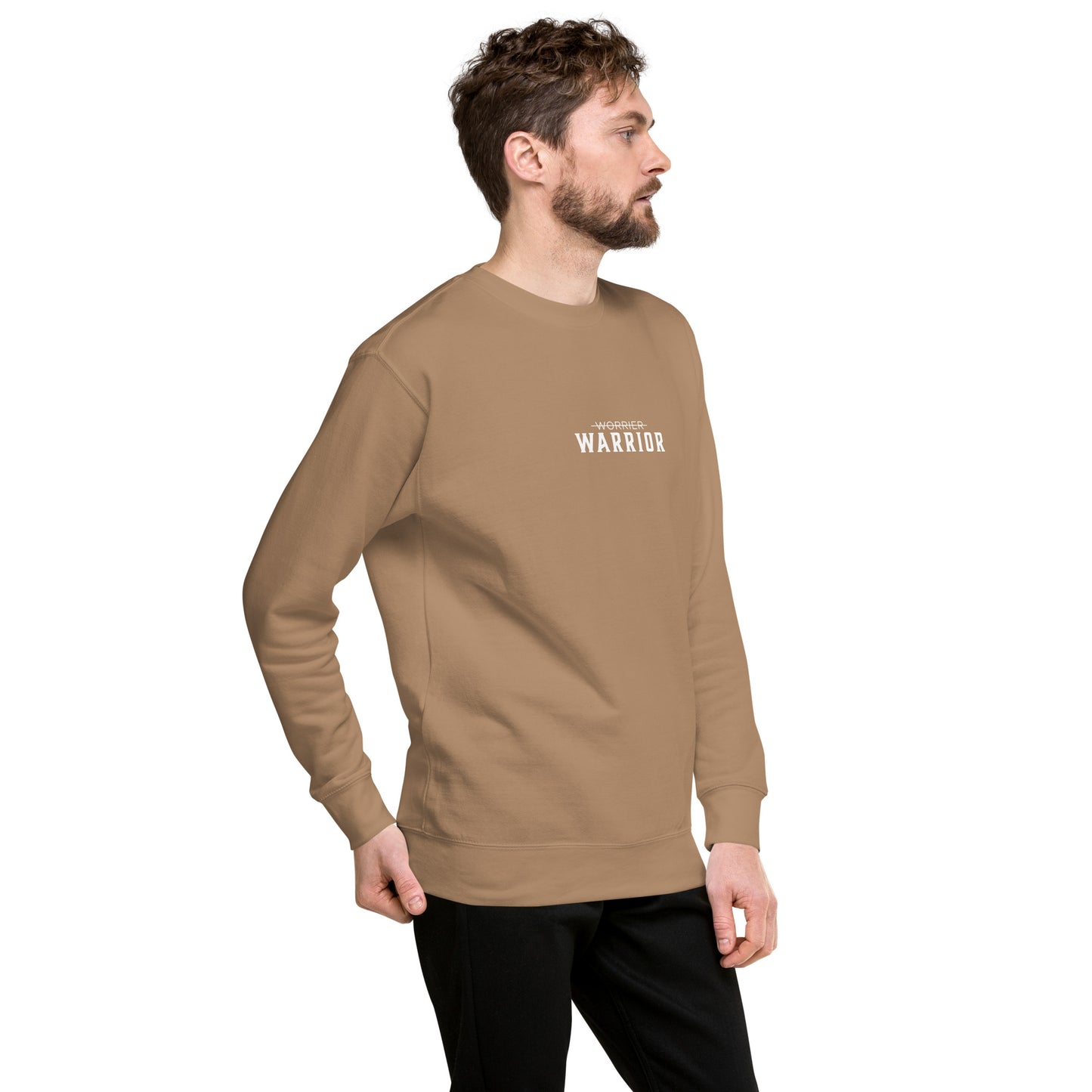 Man wearing a cream long-sleeve shirt with 'WARRIOR' printed on it, a high-quality motivational and mindset-driven sweatshirt apparel by wear grit brand clothing