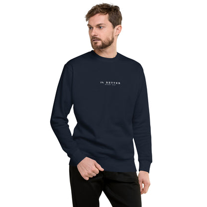 a male model wearing 1% Better Every Day — Motivational Grit Sweatshirt; mindset apparel for leaders and achievers focused on growth and discipline by wear grit brand clothing