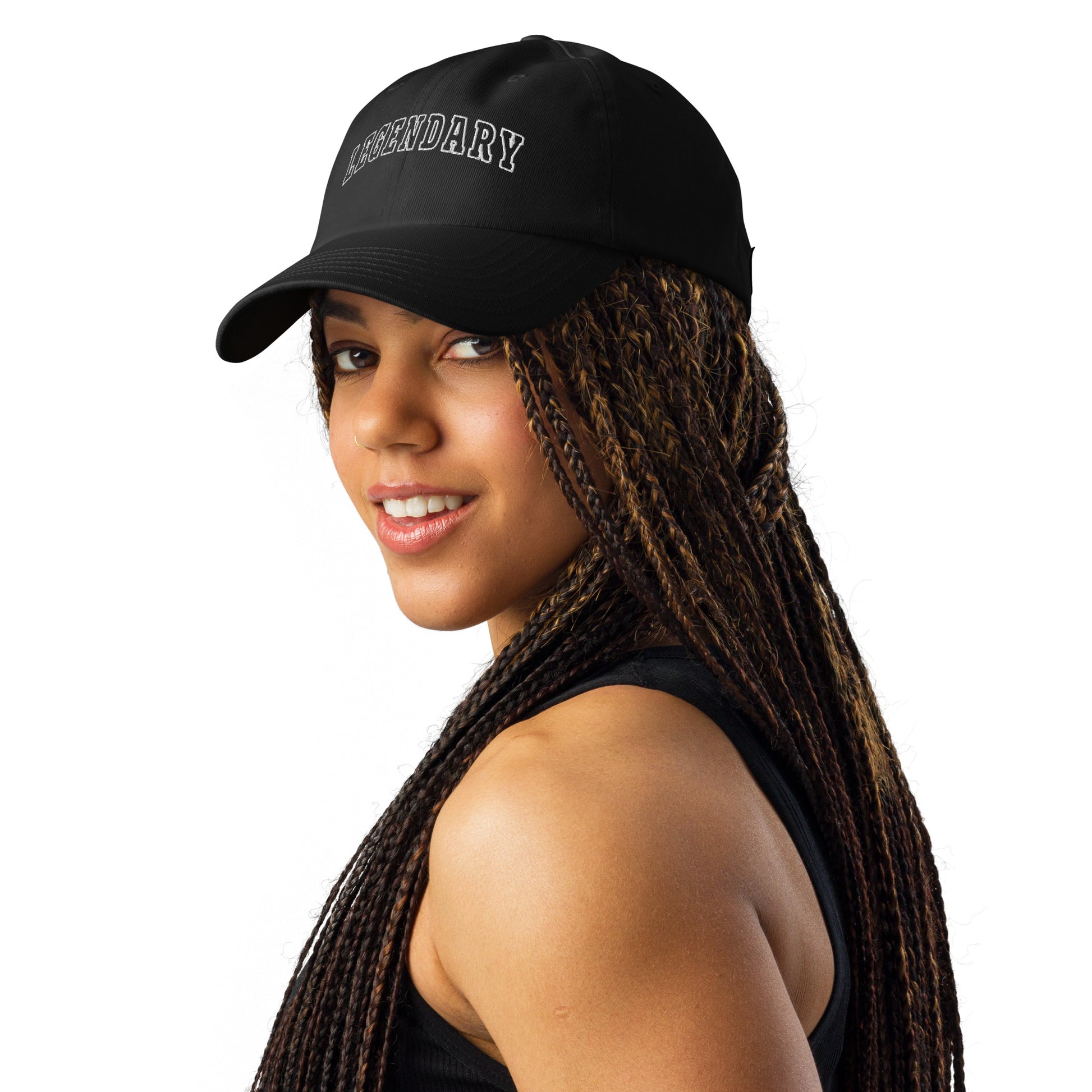 A photo of an athlete wearing black Legendary Under Armour® dad hat featuring an embroidered logo, low-profile unstructured design, adjustable strap, and performance-focused athletic style to elevate your mindset | Product by Wear Grit Brand Clothing