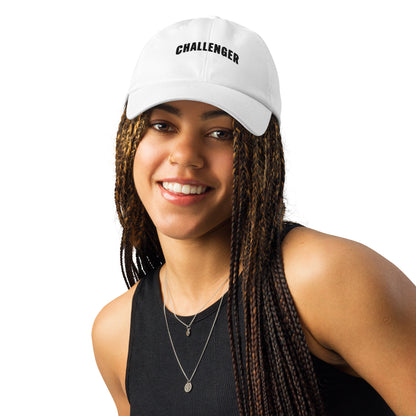 Athlete wearing white Challenger Under Armour dad hat with curved visor, low-profile unstructured fit, and embroidered logo for everyday performance wear by Wear Grit Brand
