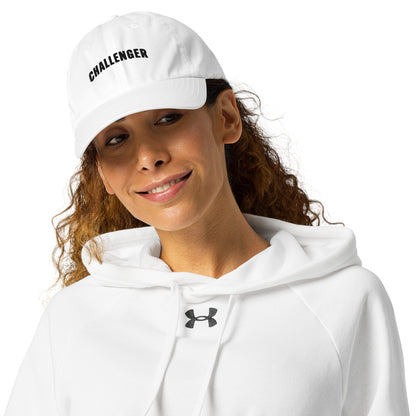 Athlete wearing white Challenger Under Armour dad hat with curved visor, low-profile unstructured fit, and embroidered logo for everyday performance wear by Wear Grit Brand