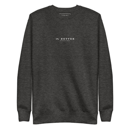charcoal sweater with a print 1% Better Every Day — Motivational Grit biege Sweatshirt; mindset apparel for leaders and achievers focused on growth and discipline by wear grit brand clothing