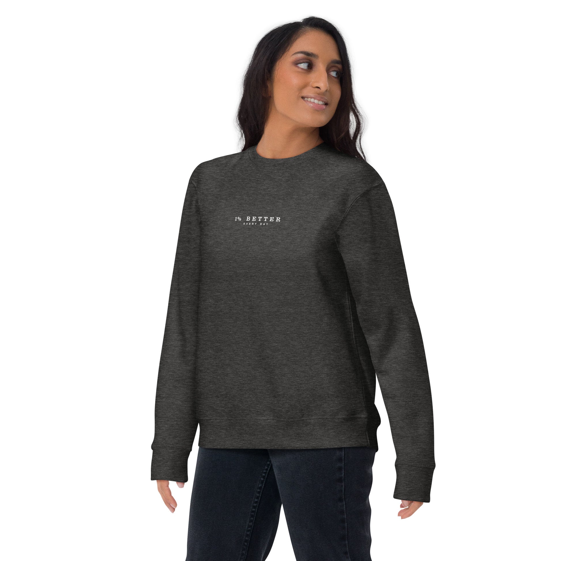 a female model with a sweater with a print 1% Better Every Day — Motivational Grit Sweatshirt; mindset apparel for leaders and achievers focused on growth and discipline by wear grit brand clothing