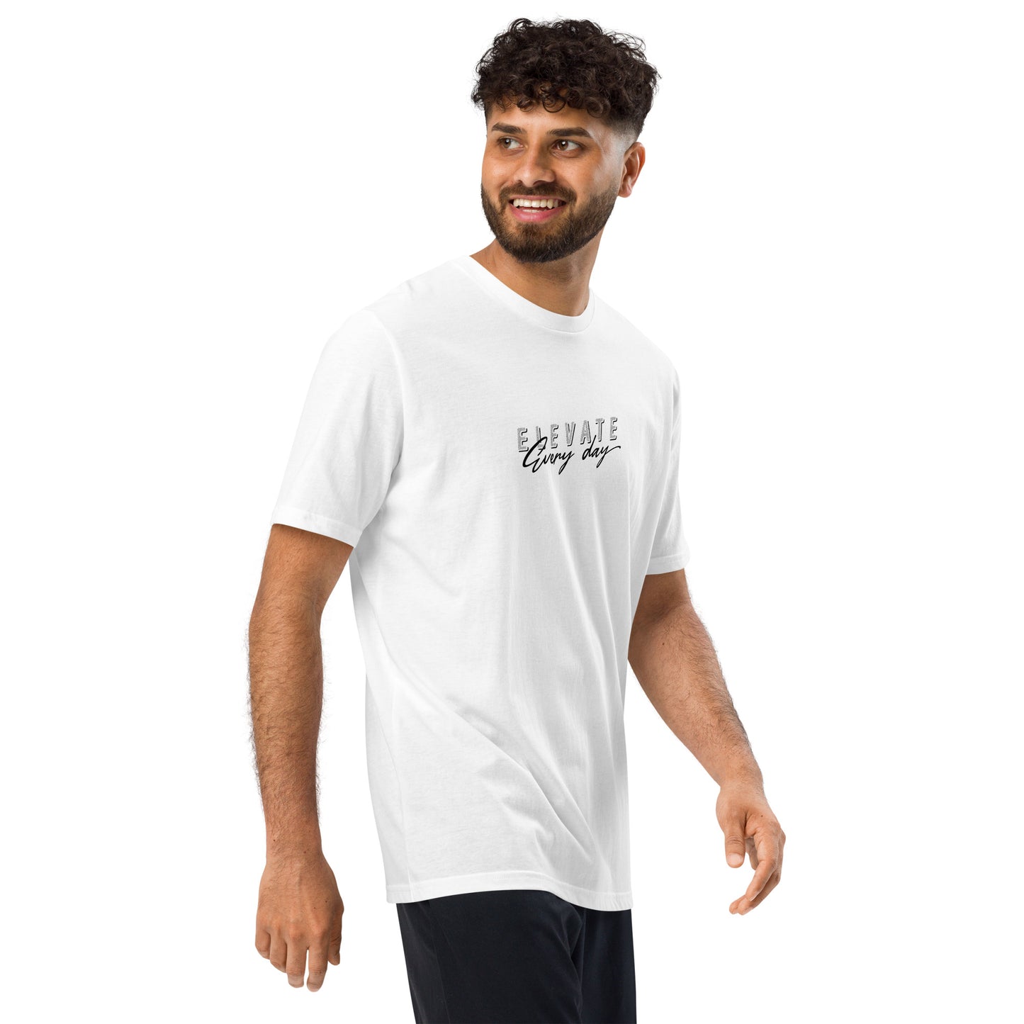 A model wearing white Elevate Every Day Under ArmourⓇ athletic t-shirt with relaxed fit and premium performance fabric, motivational sportswear by Wear Grit Brand Clothing