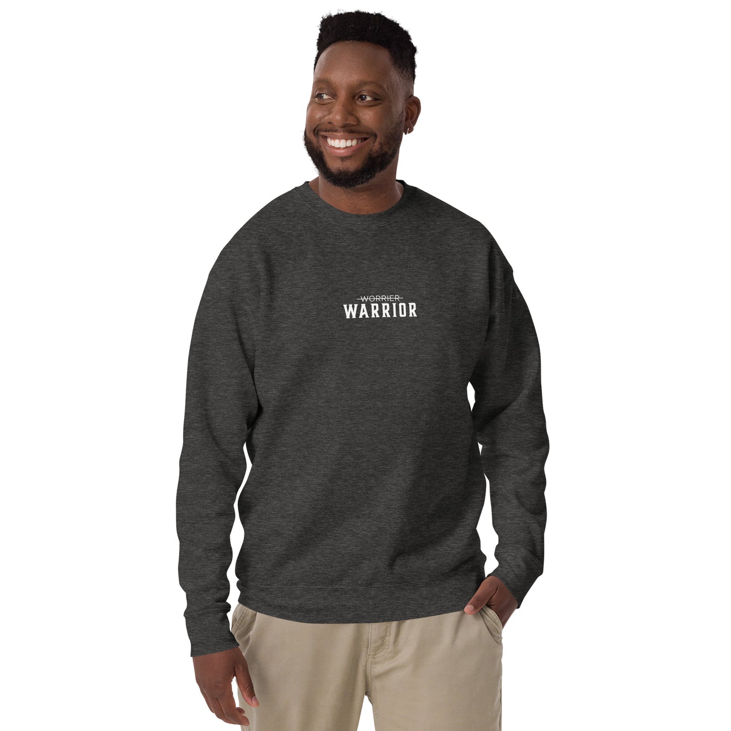 a model wearing a Warrior motivational sweatshirt with Worrier crossed out design — grit clothing for focus, discipline, and affirmation mindset growth by wear grit brand