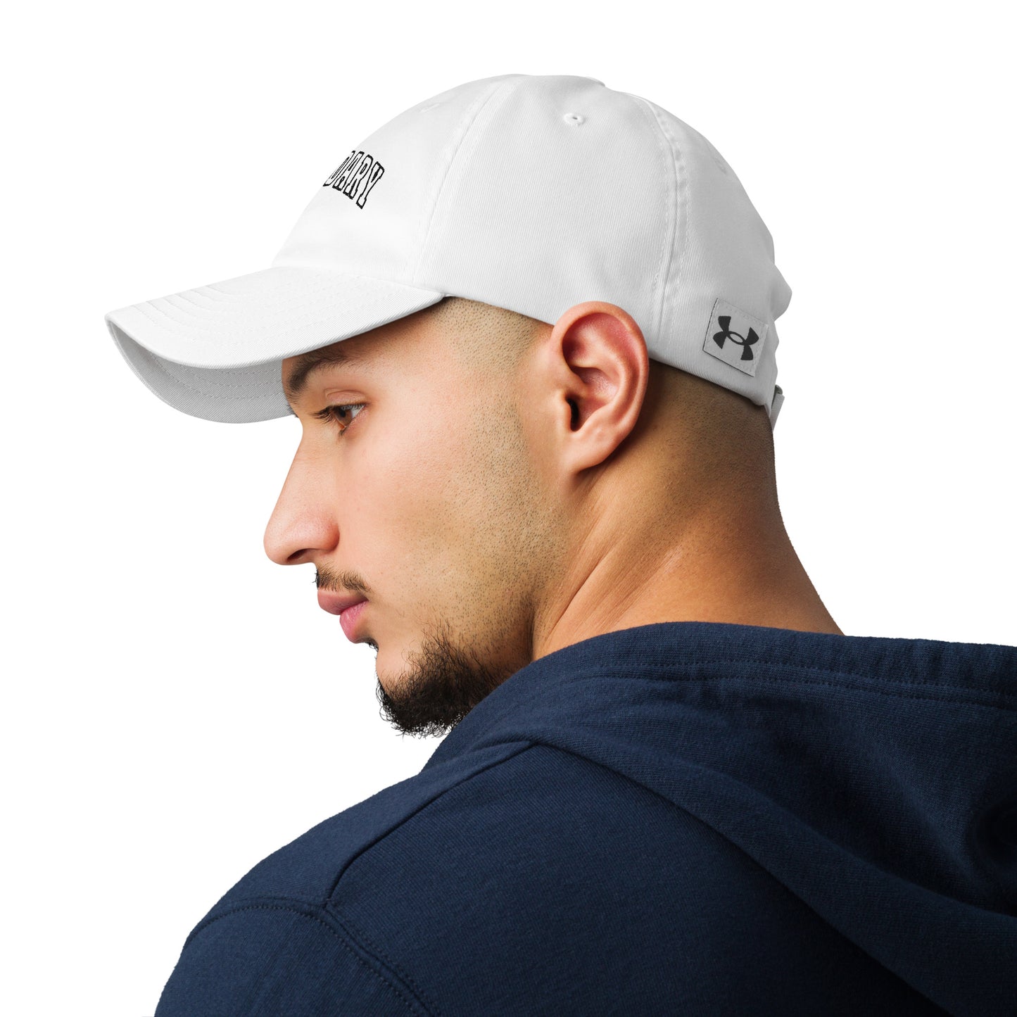 A photo of an athlete wearing white Legendary Under Armour® dad hat featuring an embroidered logo, low-profile unstructured design, adjustable strap, and performance-focused athletic style to elevate your mindset | Product by Wear Grit Brand Clothing