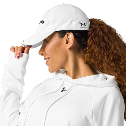 A woman wearing white Challenger Under Armour dad hat with curved visor, low-profile unstructured fit, and embroidered logo for everyday performance wear by Wear Grit Brand